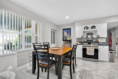 The modern eat-in kitchen is perfect for sit down meals.