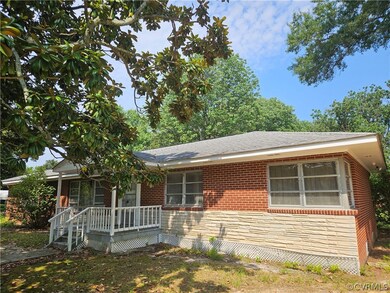 View of front of house featuring covered porch