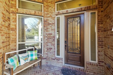 Welcome family, friends, and the delivery folks on the fully bricked covered front porch. No more soggy packages!