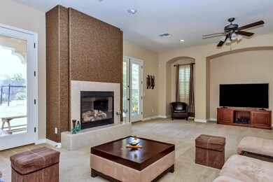 Great Room with fireplace and glass door