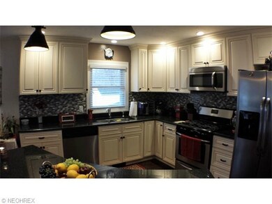 Custom kitchen w/solid maple cabinets, granite cou