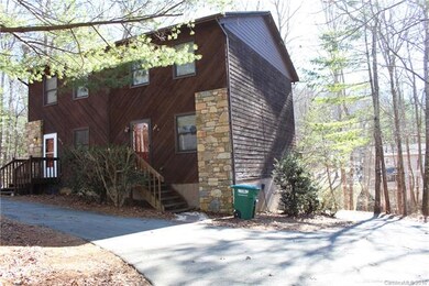 Driveway either curves around for easy egress or g