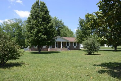 Large corner lot with mature trees with 2.66 acres