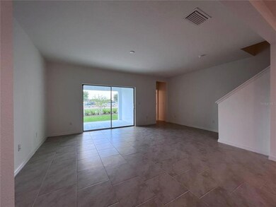 Living room view of rear covered patio