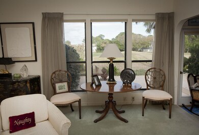 view of golf course from living room