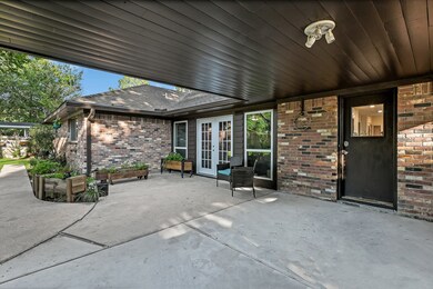 This covered patio has more space for out door activities