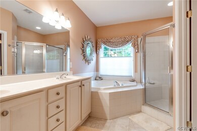OWNER'S PRIVATE EN-SUITE BATHROOM: offers ceramic