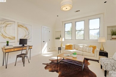Living area with carpet and baseboards