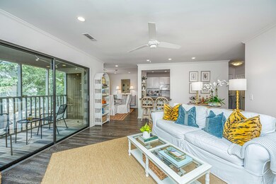 Family room w/ access to screen porch