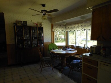 Sunny eat in kitchen area. Looks out...