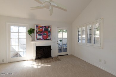 Living room w/ wood burning fireplace