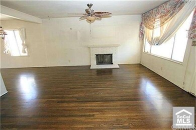LARGE LIVING ROOM WITH GORGEOUS HARDWOOD FLOORS