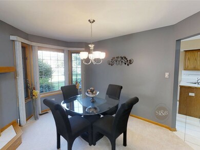 DINING ROOM WITH BAY WINDOW