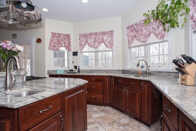 custom cherry cabinets and granite tops.