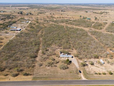 Aerial overview of property's location featuring rural landscape