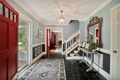 View from sunny foyer into the Family room.