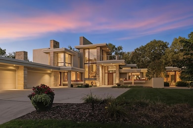 Until you tour this home, please allow this image to provide you with the sense of occasion that greets your friends as they come up to your new home. In person the hand-chiseled stone adds emphasis to an impressive statement of iconic architecture.