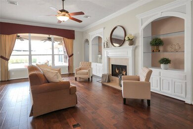 Open Family room with windows looking outside