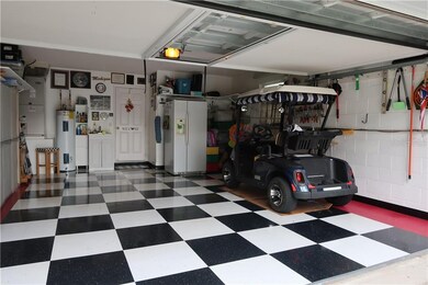 Amazing garage and cabinets and 2nd fridge stay