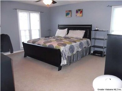 The main level Master Bedroom is quite large and c