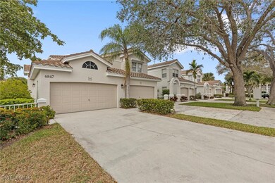 Mediterranean / spanish-style house with a garage