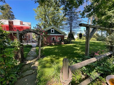 The lot is level and beautifully decorated with ha