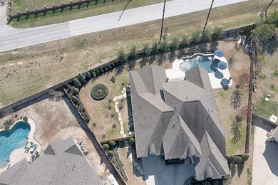 An aerial view of the home showing no back neighbors and huge lot. 
