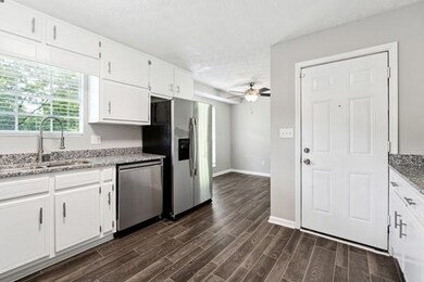 Kitchen with appliances with stainless steel finis