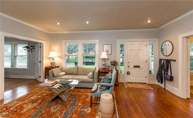 Inviting light filled living room with beautiful w