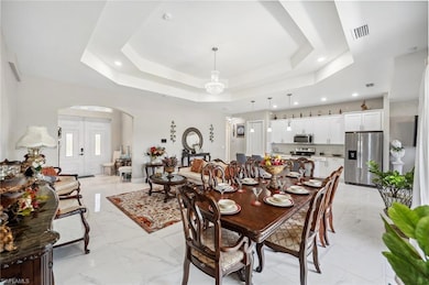 Dining space featuring recessed lighting, visible 