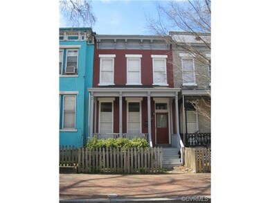 707 West Clay Street is an all brick Duplex.