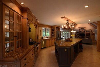Gourmet Chefs Kitchen with stainless appliances and huge island