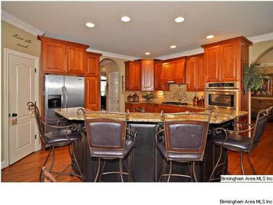 Kitchen counter tops are granite and the cabinets 