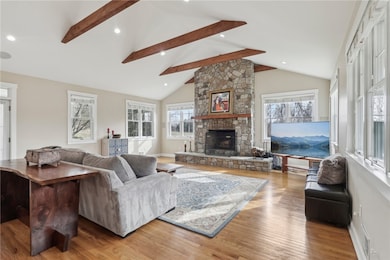 Living Room w/ Wood Burning Fireplace