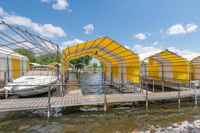 Your 27x13 covered slip is a short distance out the rear entrance and can hold a 31 foot boat. Electricity and water is onsite.