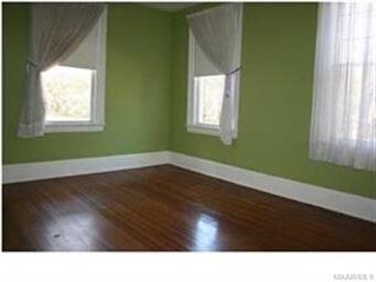 Bedroom with hardwood floors