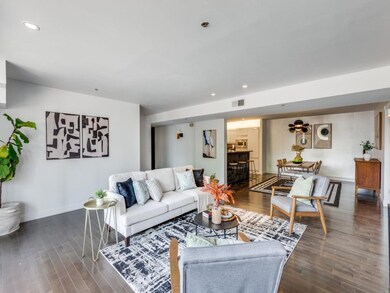 Living area featuring wood finished floors and re