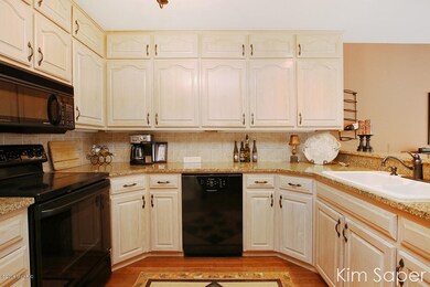 4893 N Quail Crest Dr SE unit 130, Grand Rapids, MI 49546 - photo 2