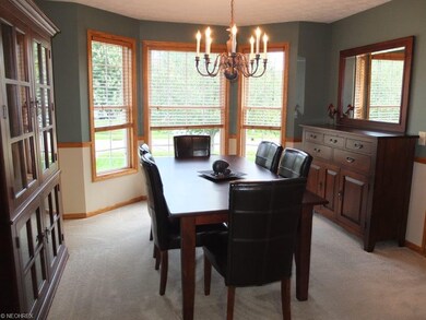 Formal dining room with chair rail.