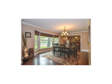 Formal Dining Room with bay window, crown molding 