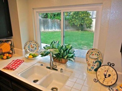 Keep an eye on the yard while preparing a great meal!