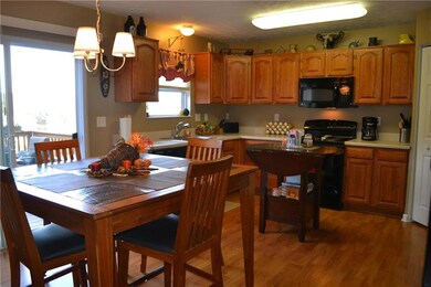 Gorgeous 17x15 eat-in kitchen with wood flooring, 