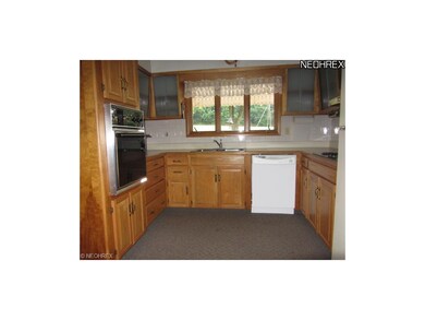 The kitchen has a lot of storage. The appliances s
