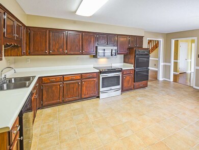 Spacious eat-in kitchen that is open to the dining
