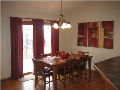 Dining area with hardwood floors