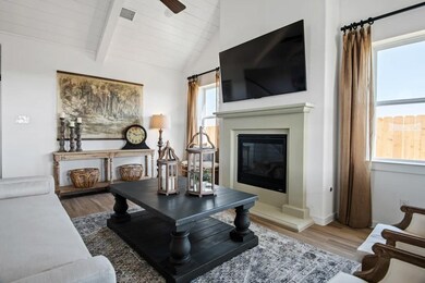 Great room with vaulted ceiling and optional fireplace