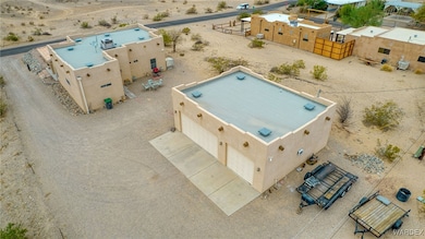 Birds eye view of property featuring view of desert