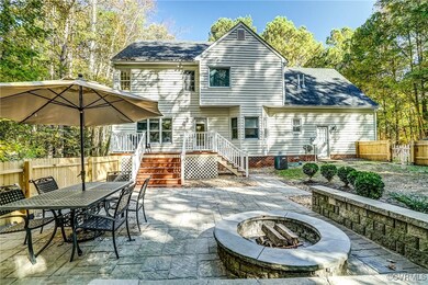 Back of house featuring a patio area and an outdoo