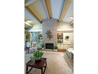 Living Room. Wonderful soaring fireplace with buil