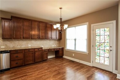 Breakfast area also has a workstation perfect for all of your cookbooks. 